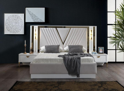 2-bedroom bed with gold embellishments and matching nightstands